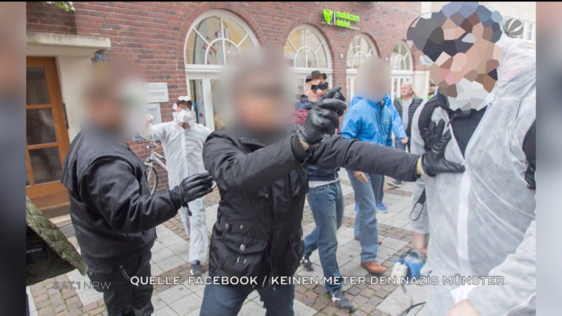 Sicherheitskräfte der AfD sprühen mit Pfefferspray (Foto: SAT.1 NRW)